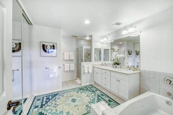 Ensuite bathroom with dual vanity and walk-in shower