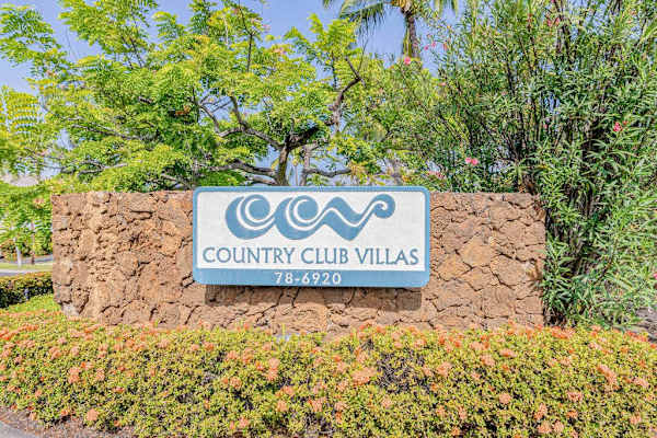 Easily locate the property by looking for the prominent Country Club Villas sign at the entrance