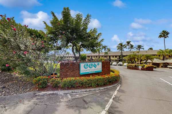 A welcoming entrance to the beautifully landscaped resort community