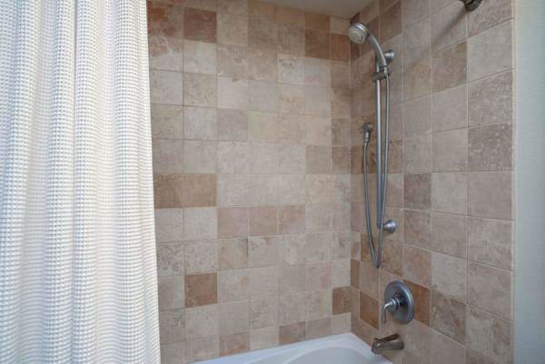 Walk-in shower with elegant tile finishes