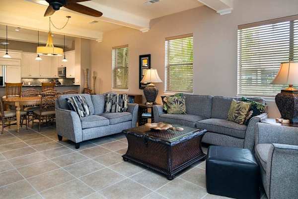 Sunlit Living Room Suite with Plush Sofas & Garden Views