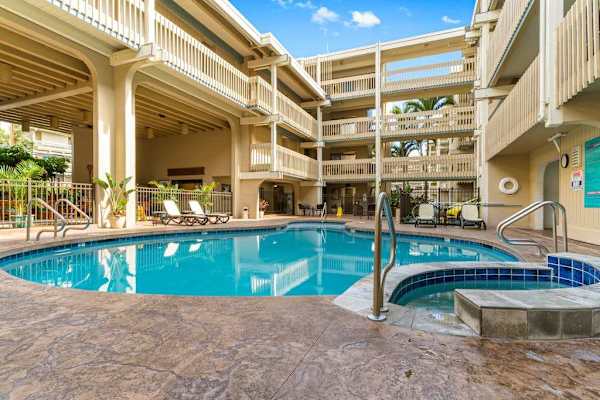 Soak Up The Sun At The Community Pool And Spa