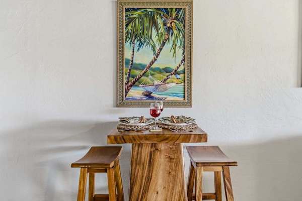 Intimate Dining Nook Featuring Local Artwork