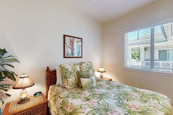 Bright Guest Bedroom with Windows & Tropical Bedding