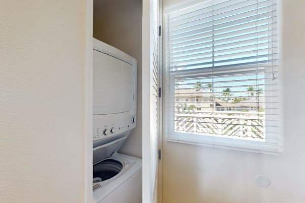 In-Unit Stacked Washer & Dryer Closet