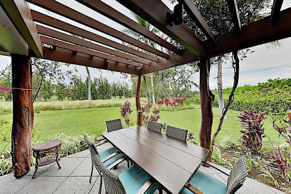 Outside covered dining with table and seating for six.  Cook a fabulous meal in your kitchen and take it outside to eat and enjoy your tropical views.