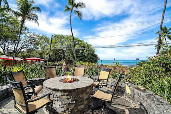 Outdoor stone fire pit seating area