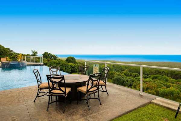 Scenic Outdoor Dining Terrace Overlooking Pool & Ocean