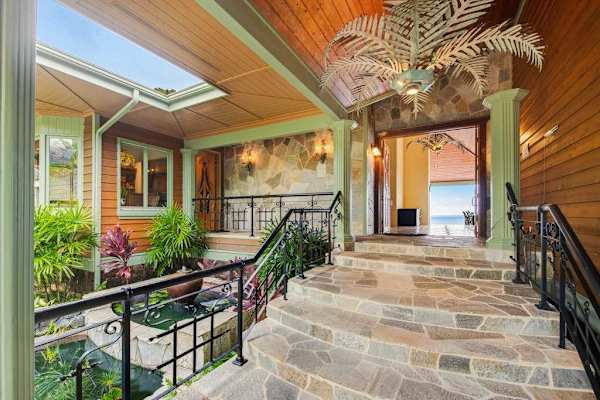 Grand Covered Entrance Steps with Skylight & Tropical Accent Detailing