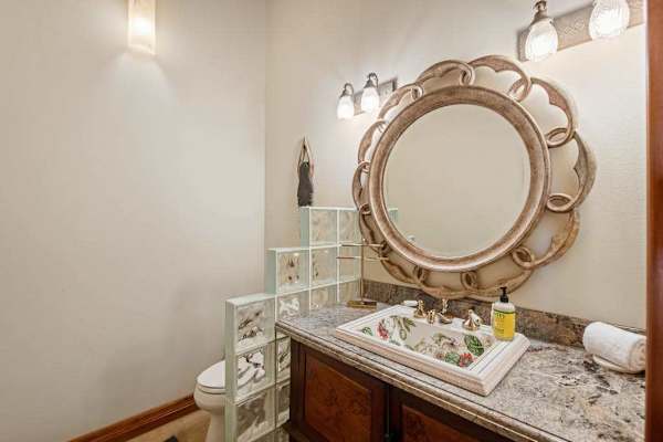 Half Bath Vanity with Ornate Mirror & Storage