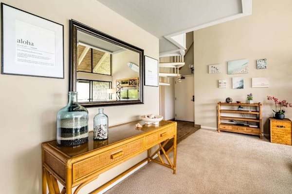 A welcoming entryway console that flows seamlessly right into the main living room