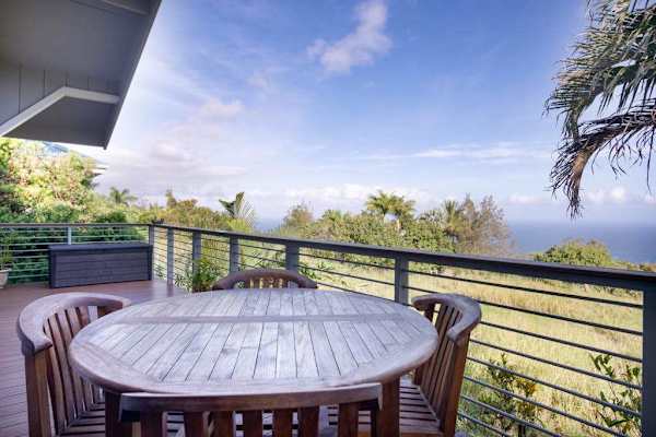 Outdoor Wooden Dining Table on Deck Perfect for Al Fresco Meals