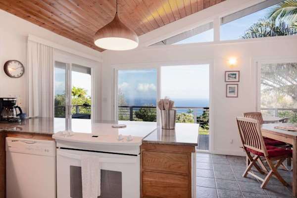 Bright Open-Concept Kitchen with Vaulted Wood Ceilings & Ocean Views