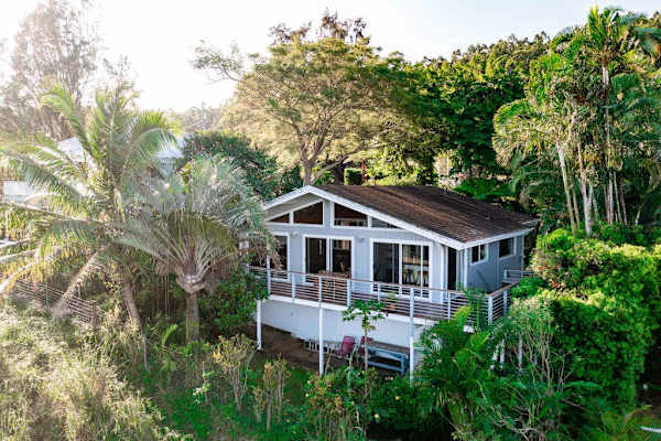 Oceanfront Tropical Home surrounded by Lush Greenery