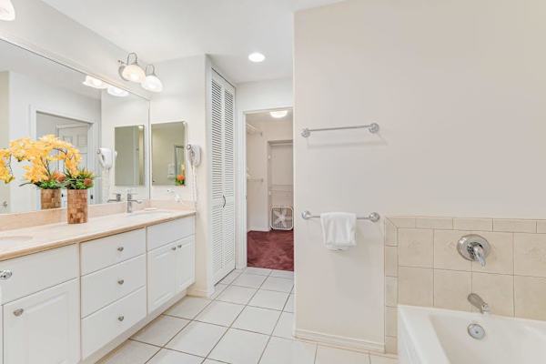 Master bedroom with double sinks, garden tub and walk in shower.