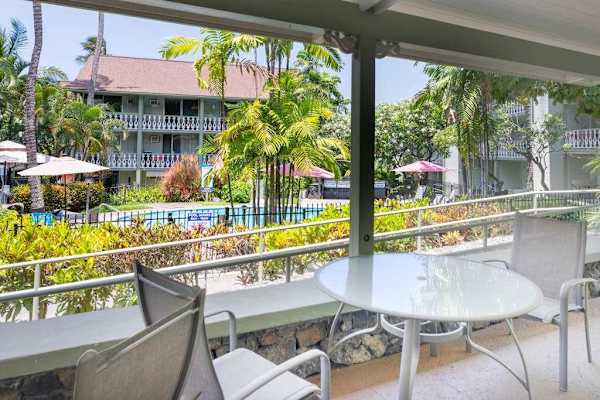 Shaded porch overlooking the resort grounds