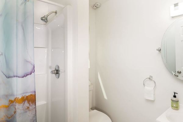 Bright Bathroom With Walk In Shower