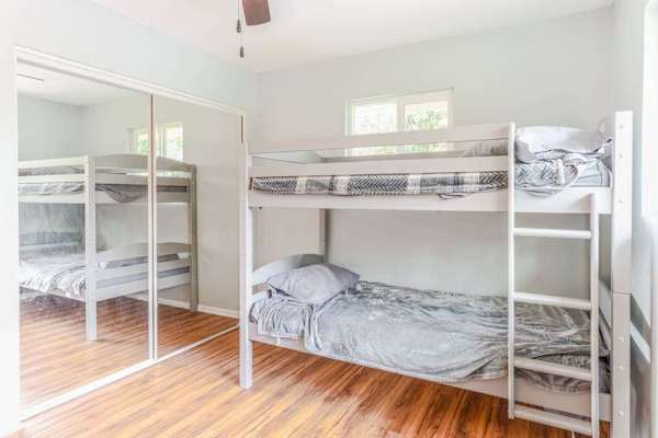 Great room for kids with these bunk beds so two twin beds.  Leaves lots of room for space for them to spread out in this room.