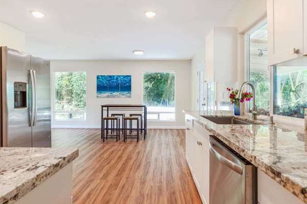 Large open air kitchen with upgraded appliances.