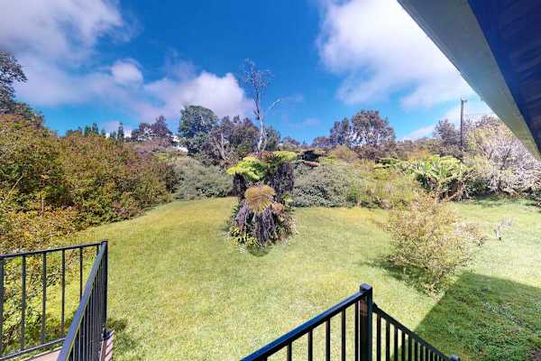 Tranquil home on 1.82-acres with a lanai.