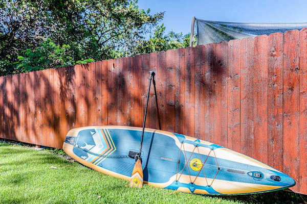 Complimentary Stand-Up Paddleboard & Paddle Included for Guest Use