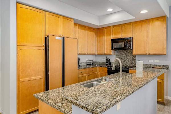 Chef's Kitchen With Granite Island