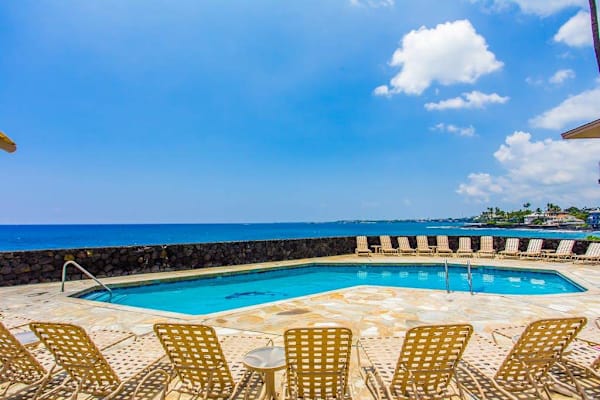 Oceanfront Resort Pool Deck Lined with Comfortable Sun Loungers