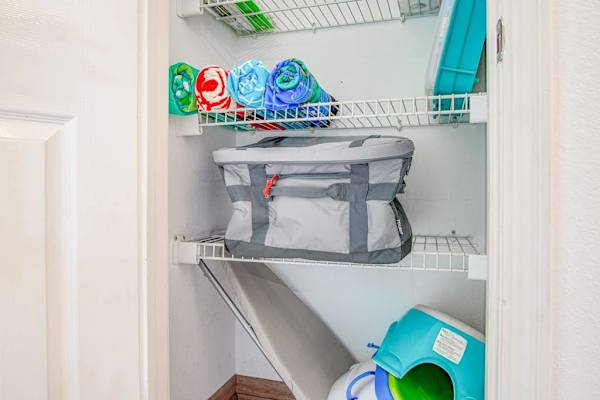 Convenient Laundry Closet With Essentials