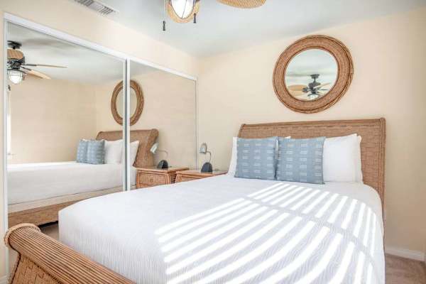 Primary Queen Bed with Crisp Linens & Mirrored Closet Doors