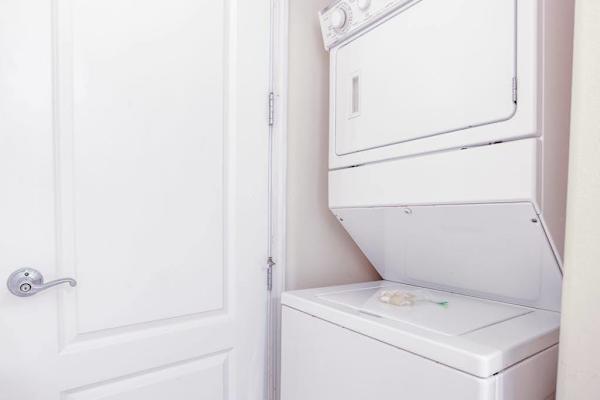In-Unit Stacked Washer & Dryer for Guest Convenience