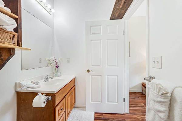 Full bathroom with tub/shower combo.