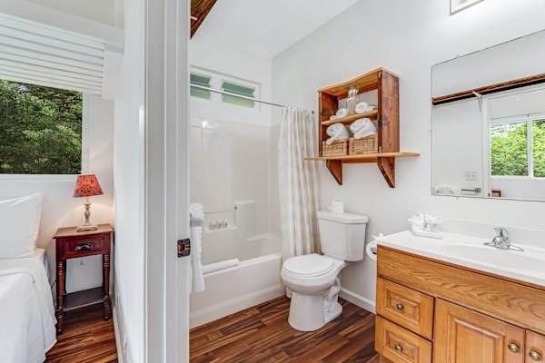 Full bathroom with tub/shower combo.