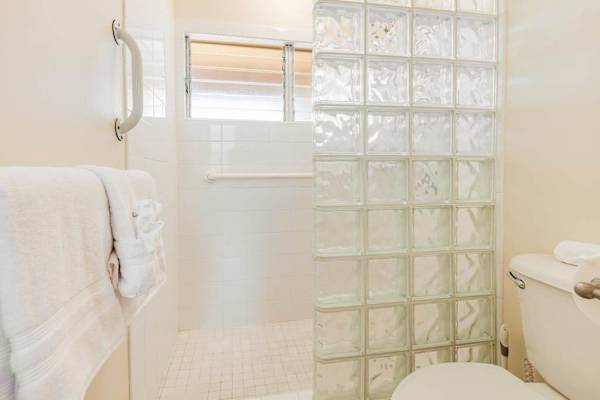 Relaxing Master Bath with Convenient Grab Bars & Built-In Bench
