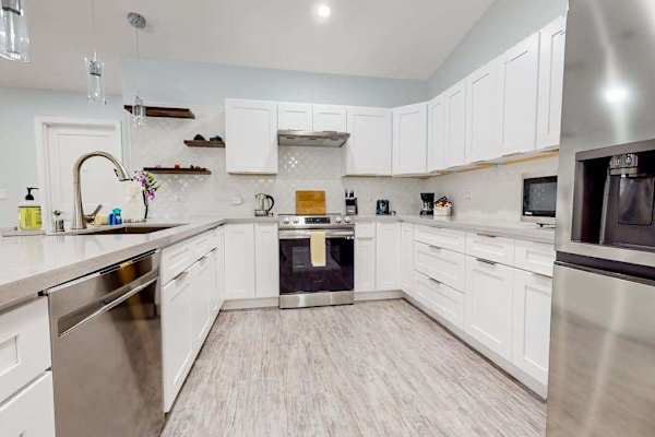 A well-appointed kitchen boasts modern appliances,  create hearty breakfasts or quick snacks with ease.