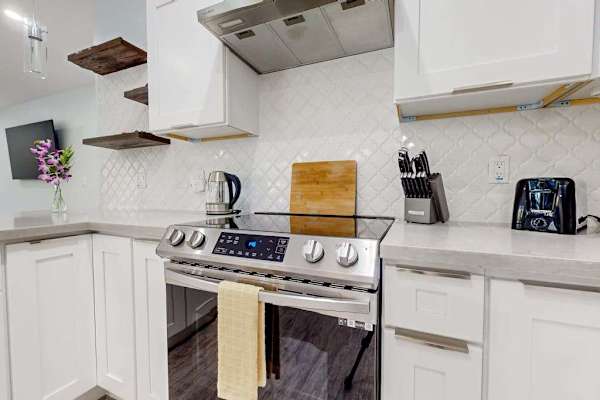 A well-appointed kitchen boasts modern appliances,  create hearty breakfasts or quick snacks with ease.