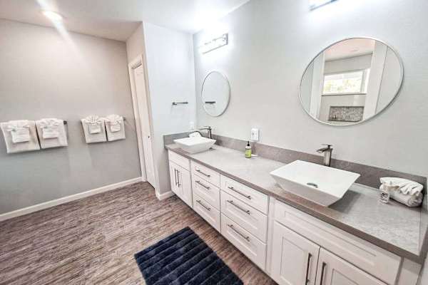 Master en-suite bathroom with double sinks and walk in shower.