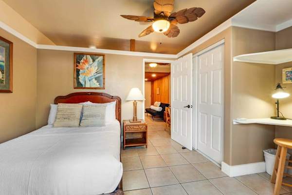 Queen bed, ceiling fan and great views out of your private lanai.