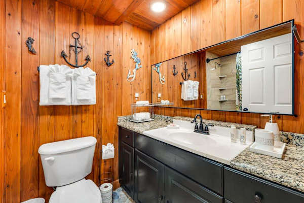 Master bathroom with lots of counter space and a tub/shower combo. 