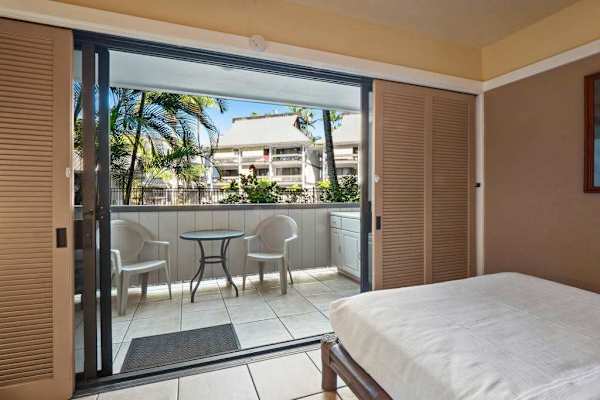 Studio with queen bed, ceiling fan and great views out of your private lanai.