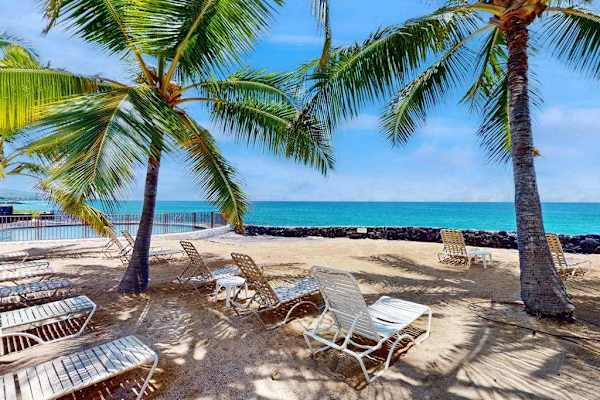 Private Oceanfront Beach Area with Loungers & Palm Shade
