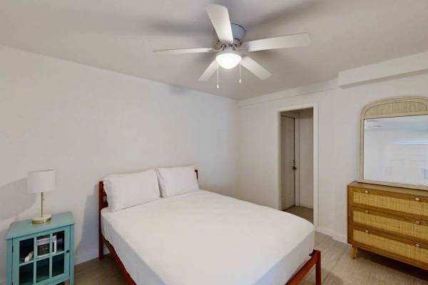 Island Queen Sanctuary with Dresser & Ceiling Fan