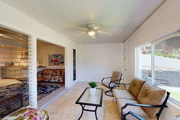 Covered Lanai Lounge with Glass Coffee Table