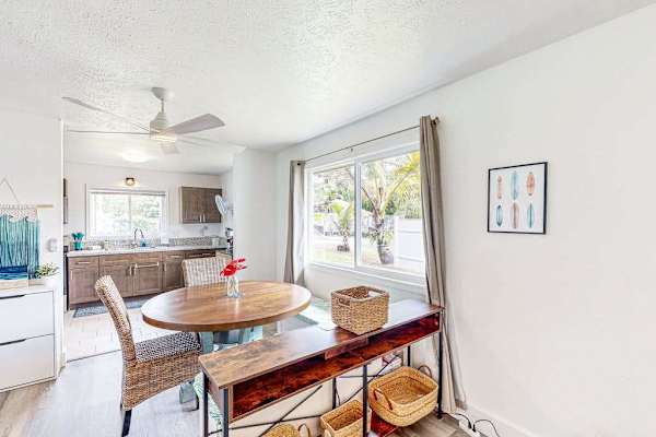 Dining room table with a view out of your tropical paradise.