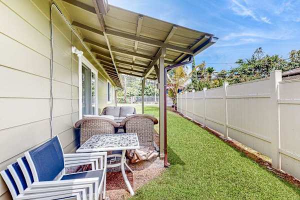 Backyard with very fence for extra privacy.