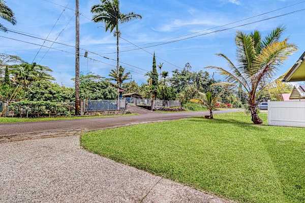 Escape to a private tropical oasis surrounded by lush Hawaiian landscaping, swaying palms, and the peaceful beauty of paradise.