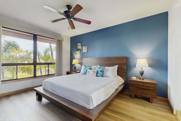 Drift off in a serene king bedroom designed for restful nights.