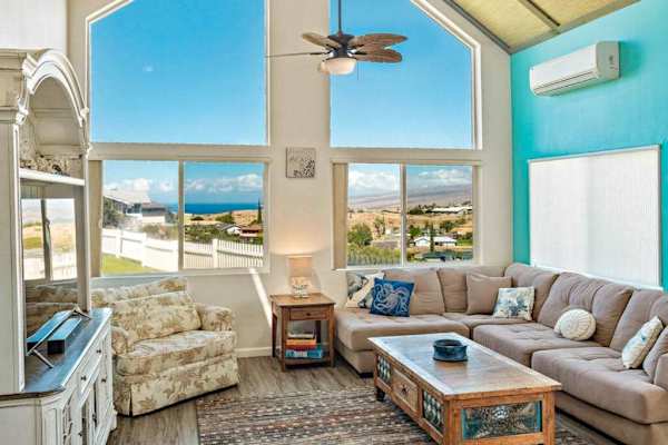 Unwind in front of these floor to ceiling windows in the family room while watching a movie. 