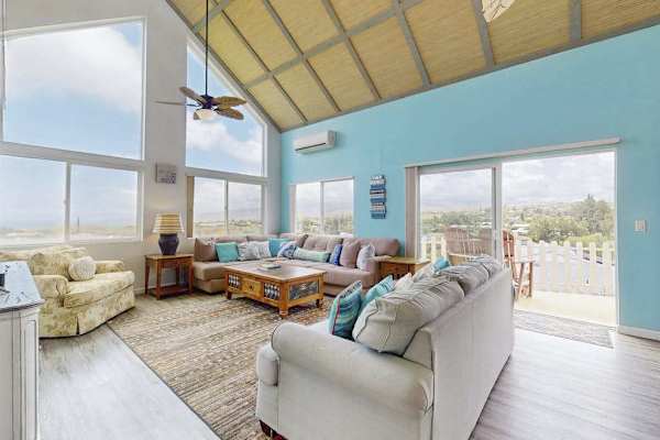 Unwind in front of these floor to ceiling windows in the family room while watching a movie. 