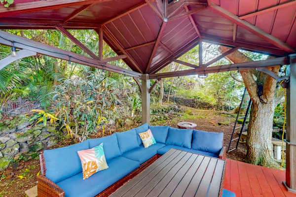 Covered pavilion creates a retreat with garden seating and shade