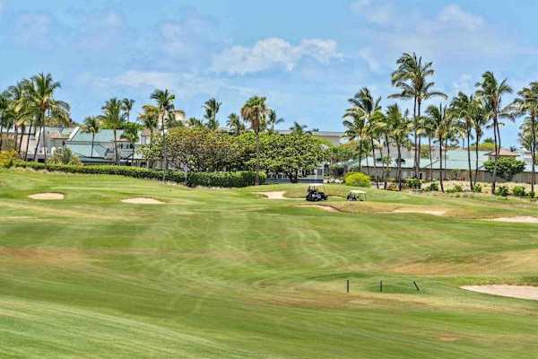 Beautiful golf course surrounded by palm trees